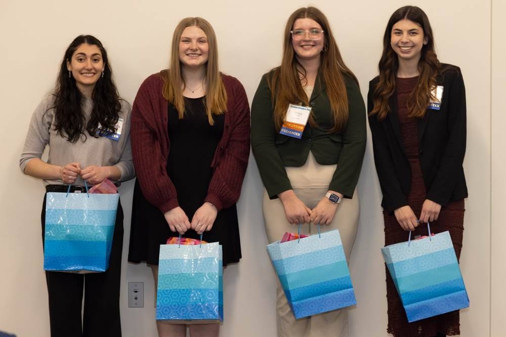 2025 PSY Award Ceremony recipients posing with gift bags